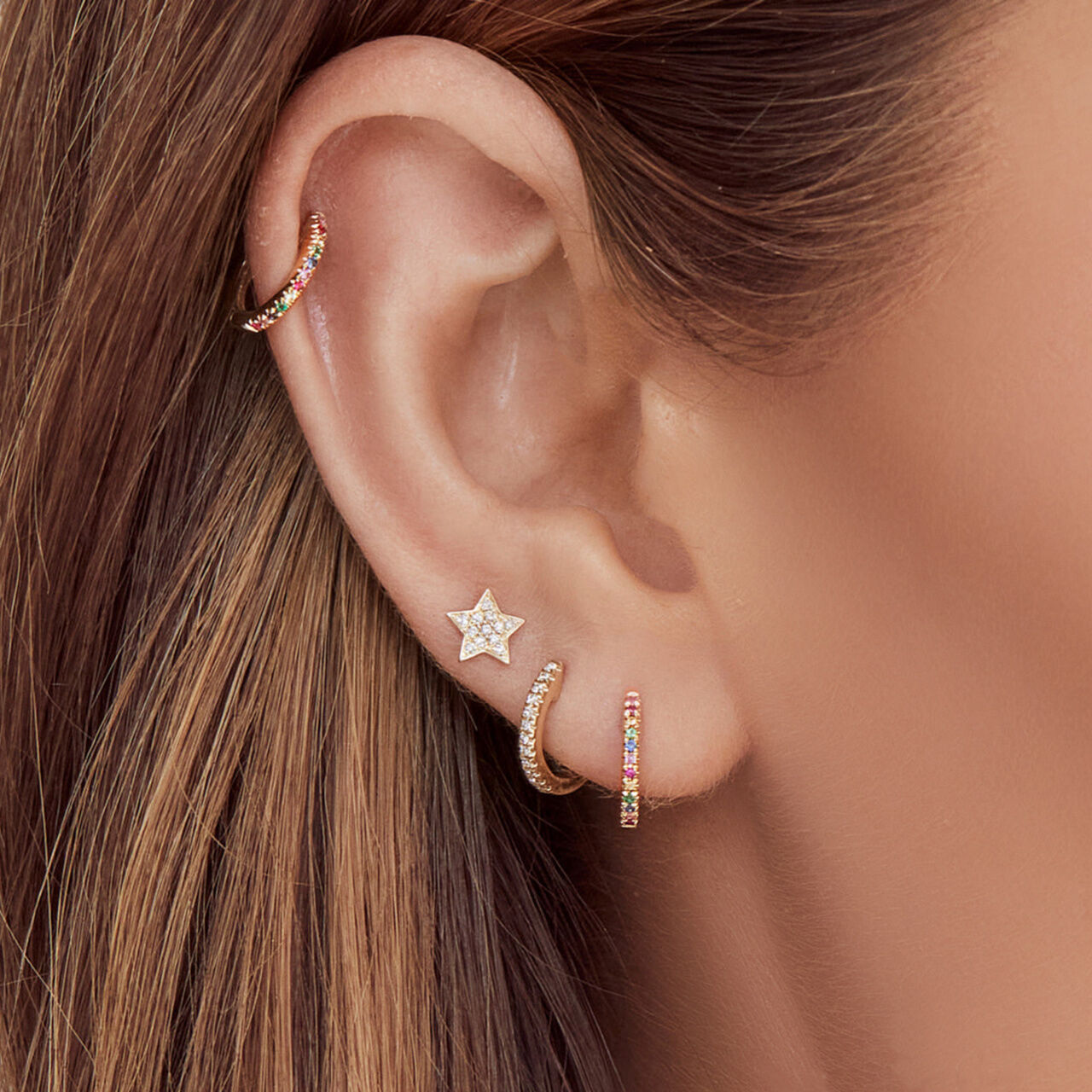 Gold diamond huggie earrings store